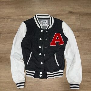 Reflex Varsity Bomber Jacket in Black, White, and Red